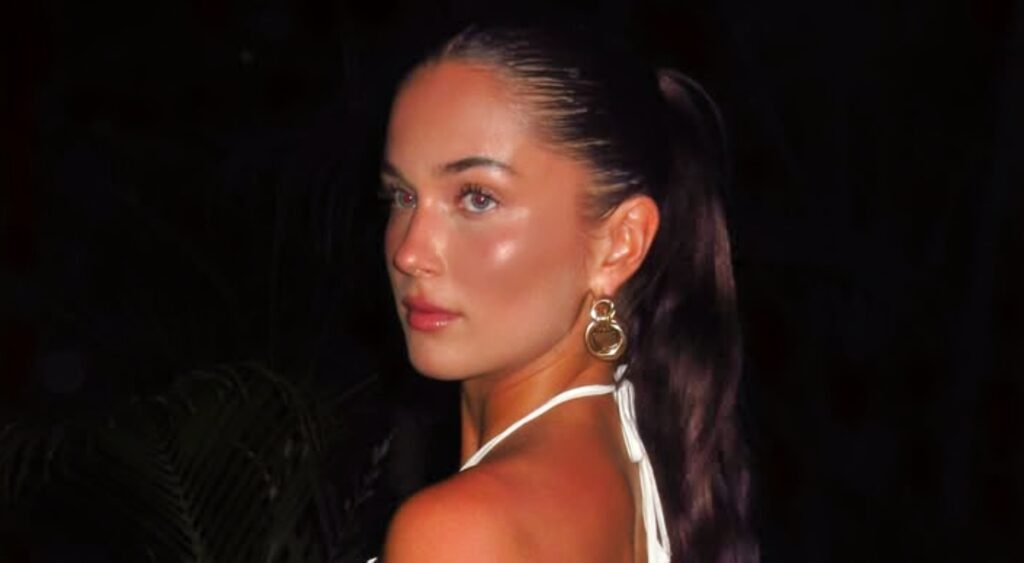 Stephyn Wilfawn posing in a white dress.