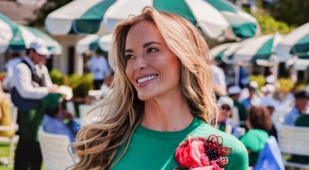 Jena Sims posing in green outfit
