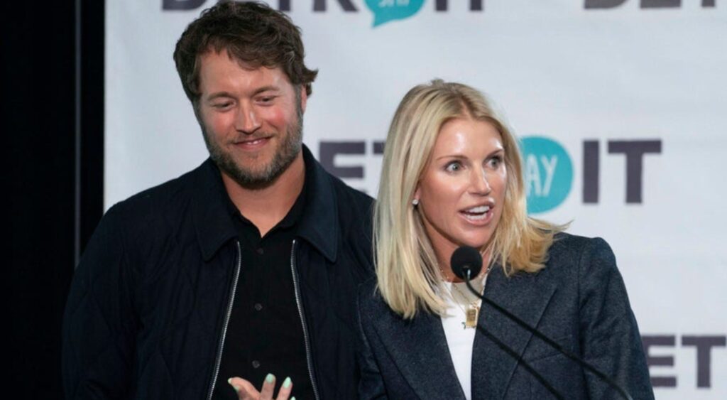 Matthew and Kelly Stafford speaking to reporters