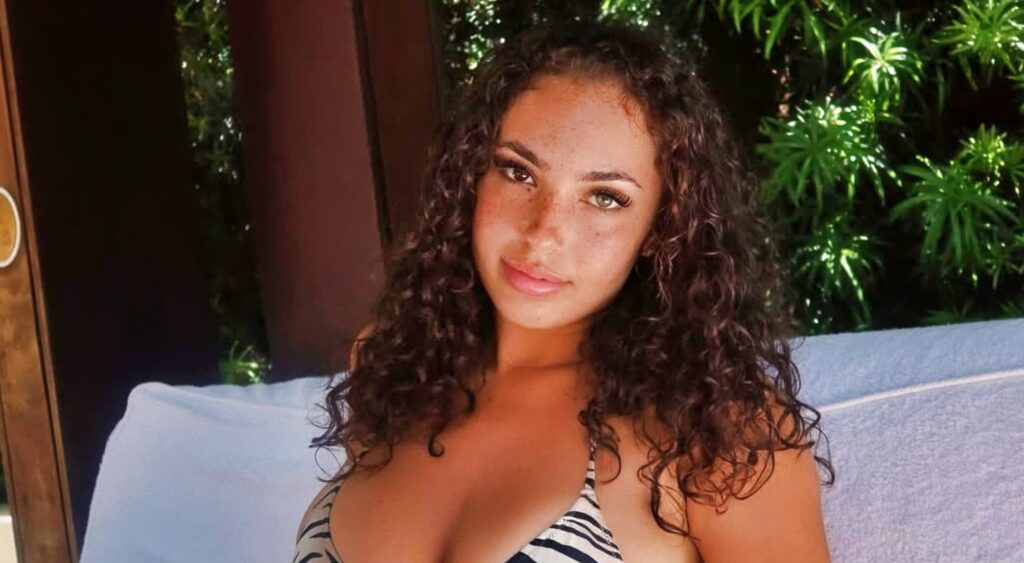 Ash Kaash posing in a bikini