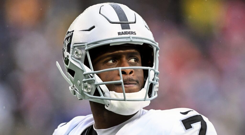 Las Vegas Raiders quarterback Geno Smith in uniform.