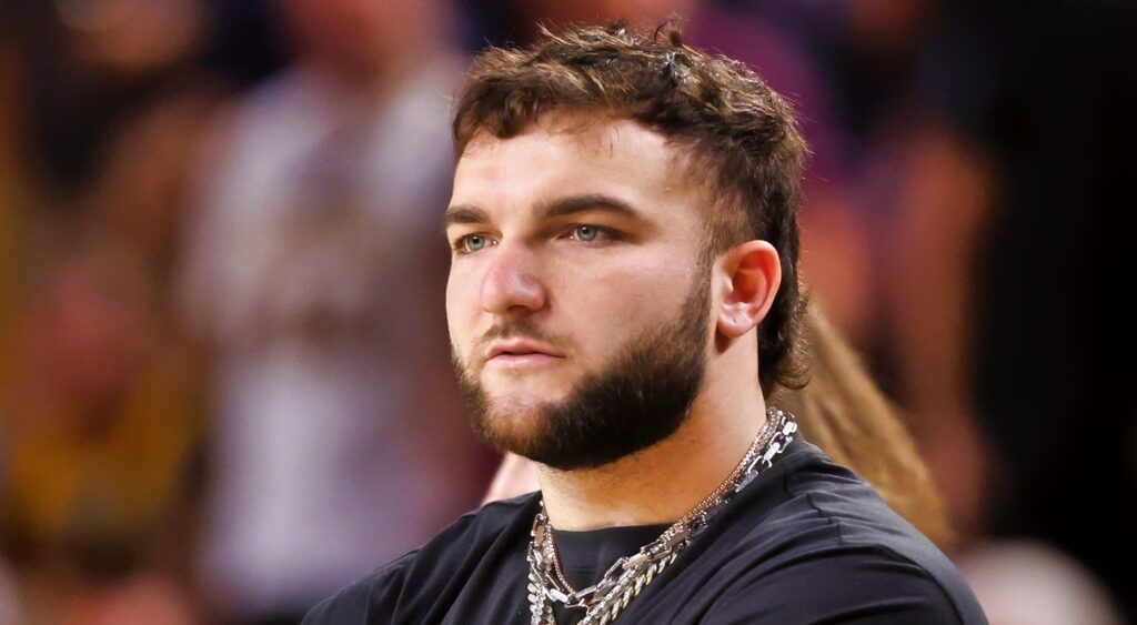 Cam Skattebo at college basketball game.