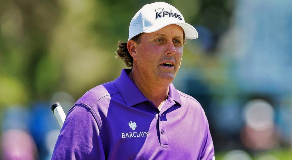 Phil Mickelson walks off the 7th hole during the third round.