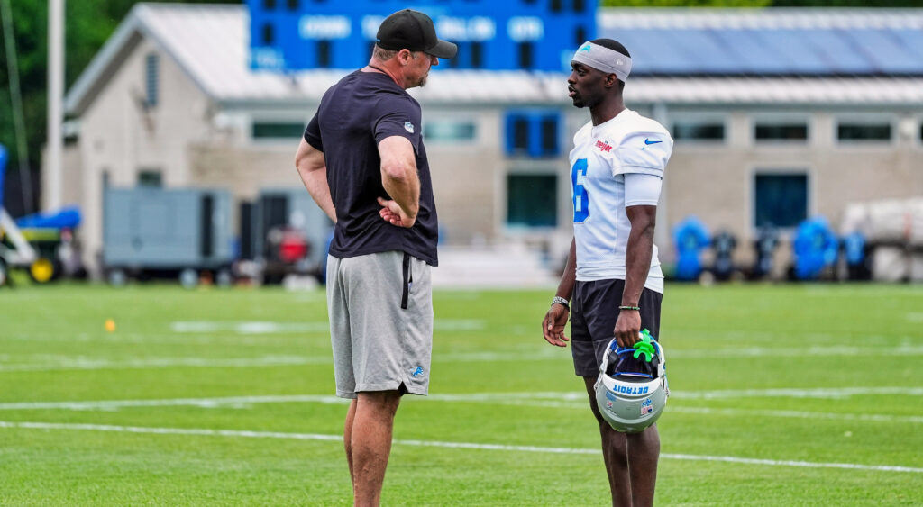 Dan Campbell and Terrion Arnold at practice. 