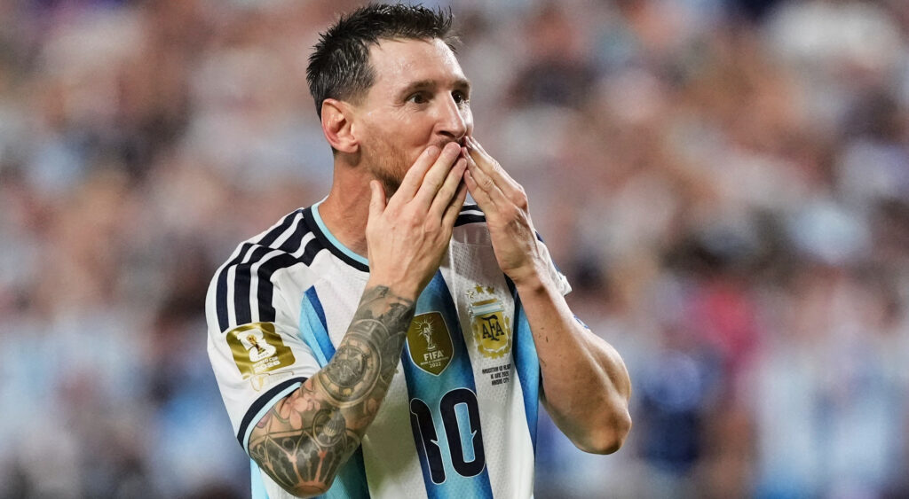 Lionel Messi celebrates after scoring against Algeria.