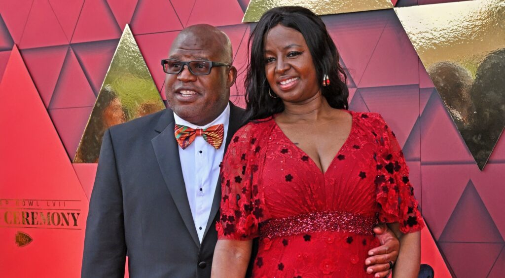 Kansas City Chiefs Offensive Coordinator Eric Bieniemy posing with hsi wife.