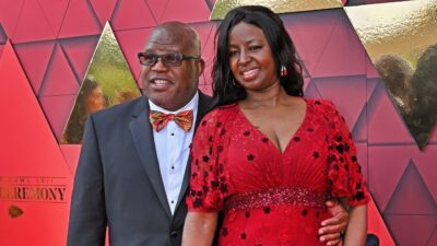 Kansas City Chiefs Offensive Coordinator Eric Bieniemy posing with hsi wife.