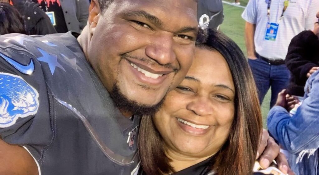 Calais Campbell posing with his mother.