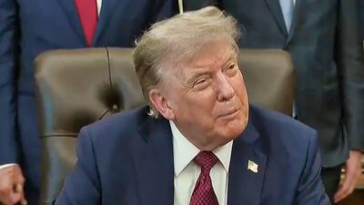 Donald Trump speaking to reporters.