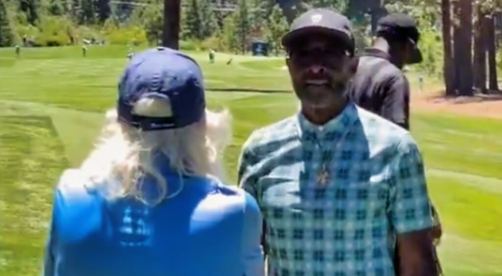 Jerry Rice yelling at a fan.