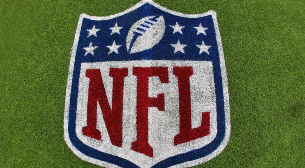 NFL logo on the field.