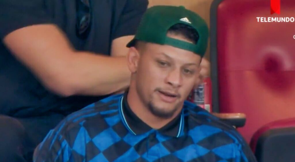 Patrick Mahomes sitting in the stands.