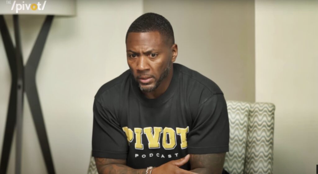 Ryan Clark sitting on a chair.