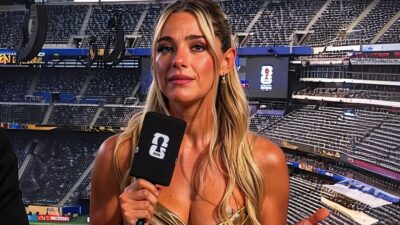 Sol Rivas holding mic
