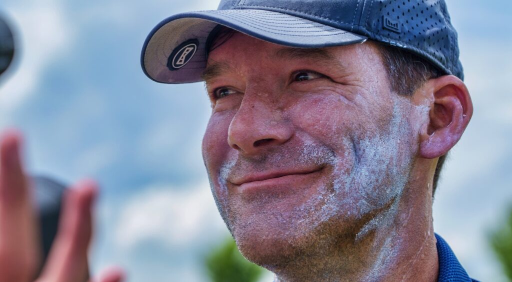 Tony Romo smiling.