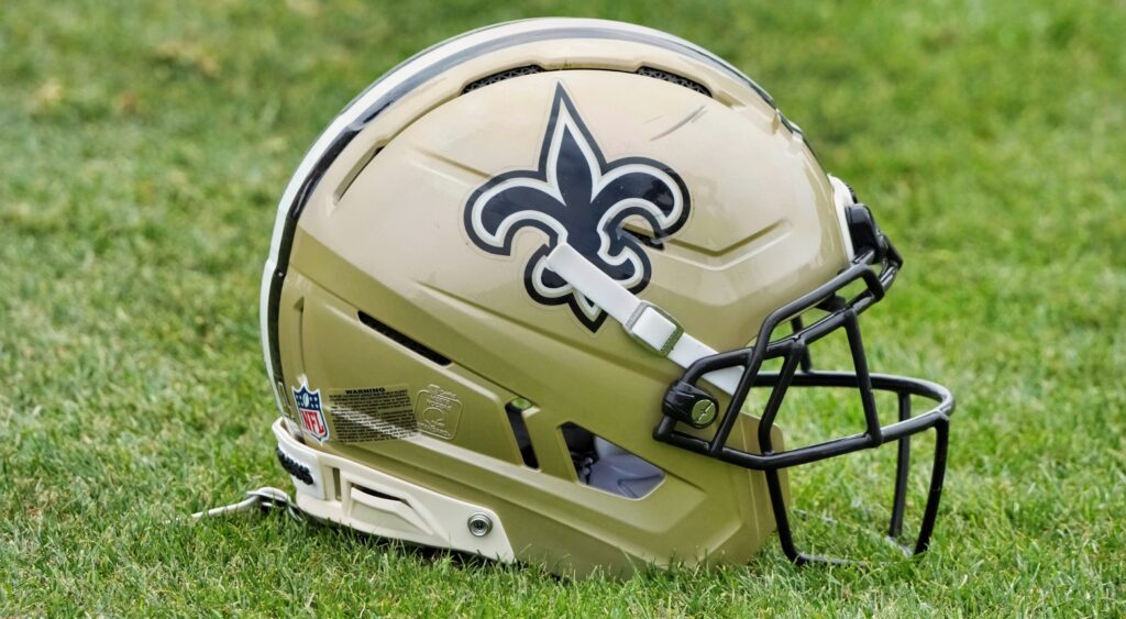 Saints helmet on the field.