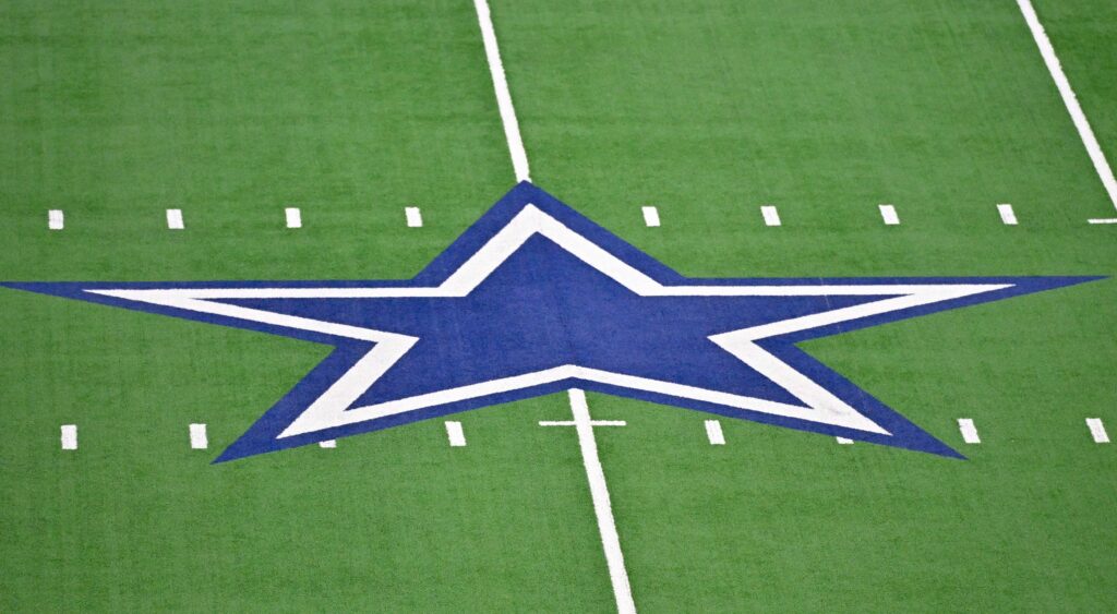 Cowboys logo at midfield.