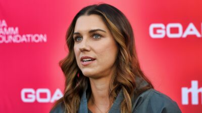 Alex Morgan speaking to the media.