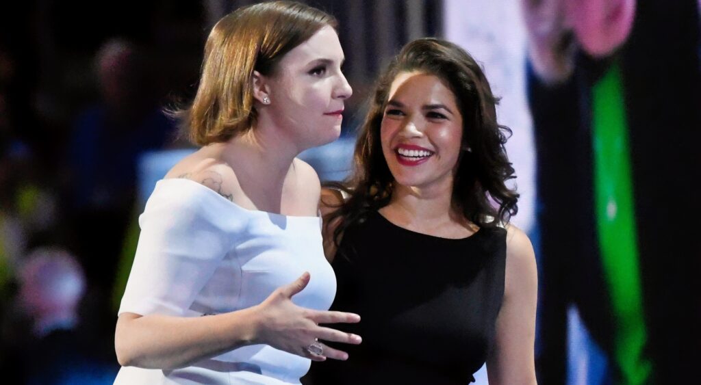 Lena Dunham and America Fererra walkign on stage