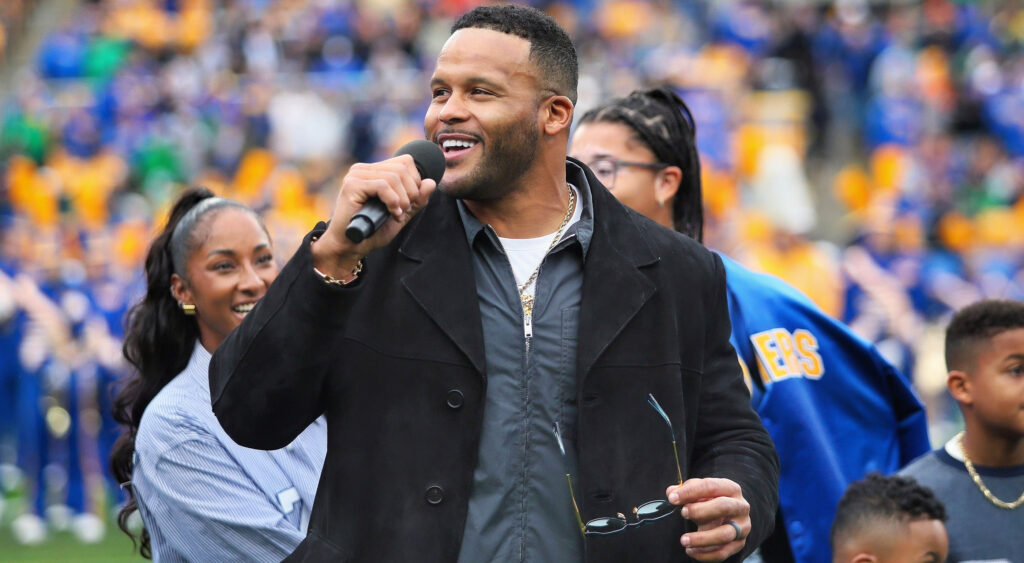 Aaron Donald speaks to the crowd.