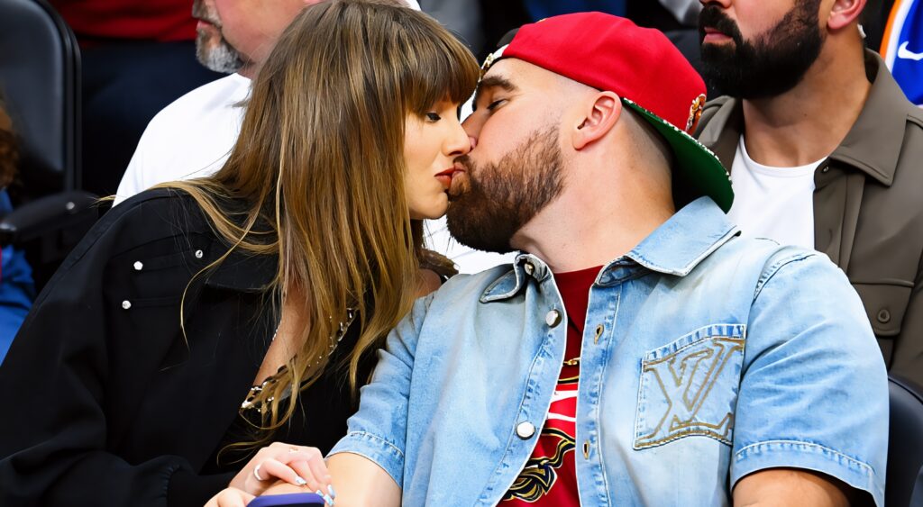 Taylor Swift kissing Travis Kelce