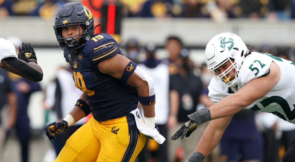 Ivan Garza rushing an opposing quarterback.