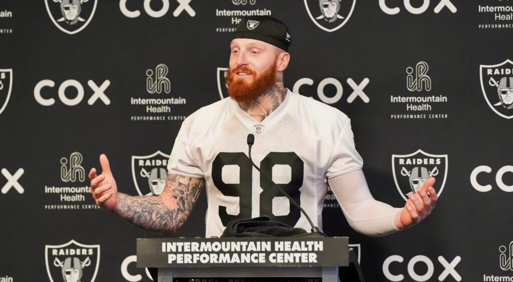 Maxx Crosby at a press conference.